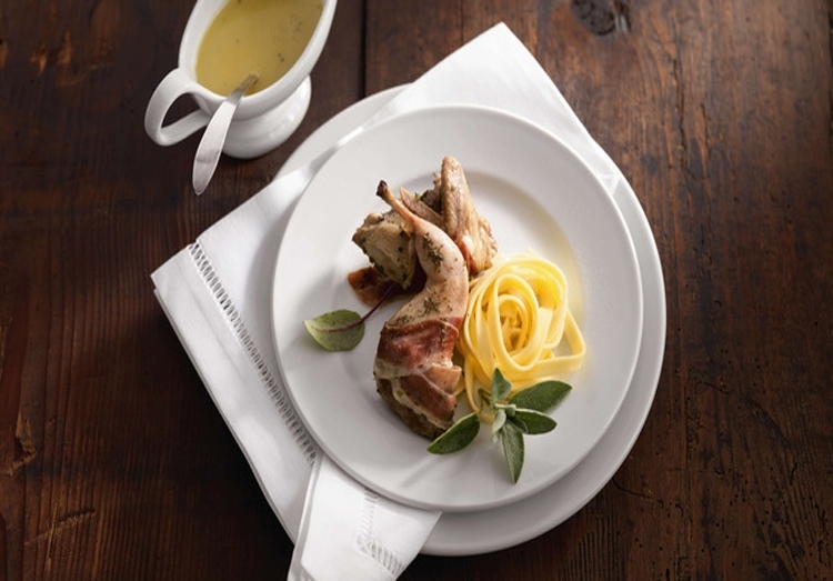 Quail saltimbocca in herb sauce 